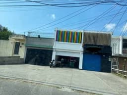 VENTA DE CASA CON 2 LOCALES COMERCIALES EN COLONIA MONTE MARIA