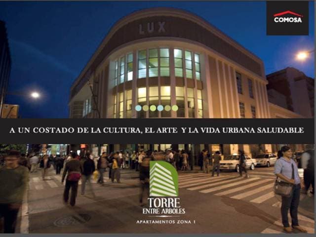torre entre arboles apartamentos — foto 2